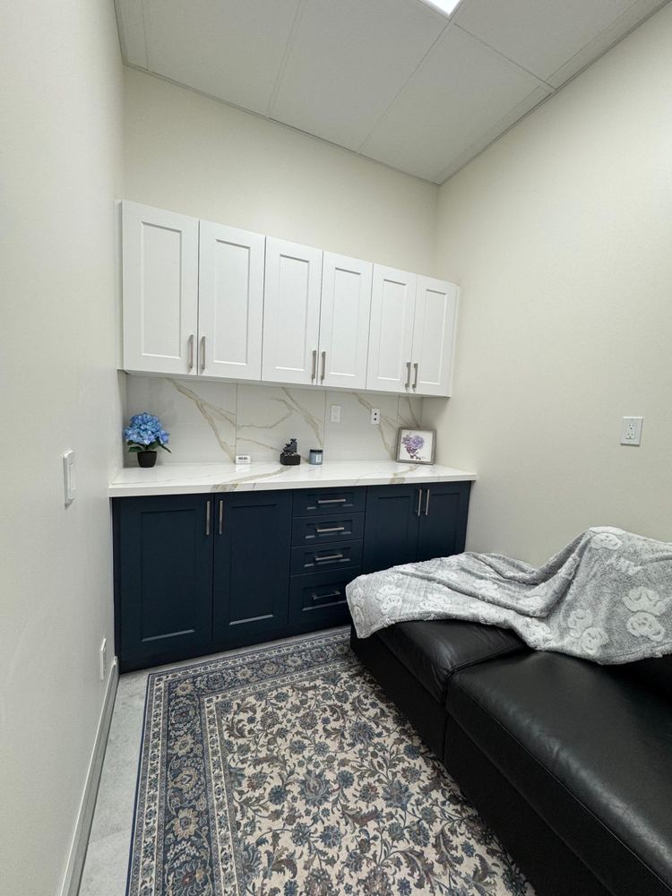 Quiet comfort room with a sofa, blanket and patterned rug